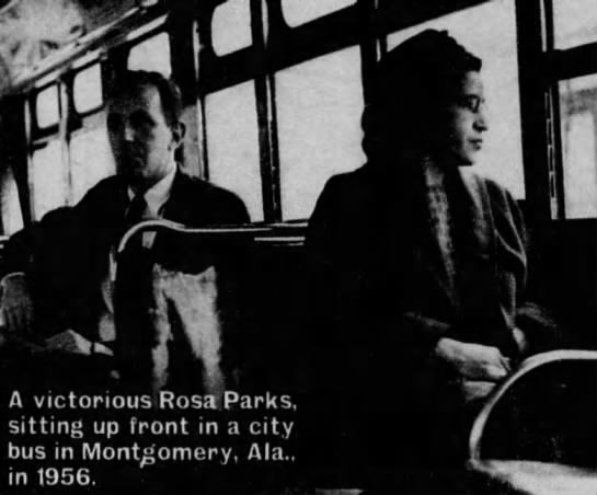A victorious Rosa Parks sitting up front